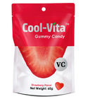 La fraise drôle de vitamines gommeuses délicieuses de fruit a conçu petit 60g en forme de coeur par sac