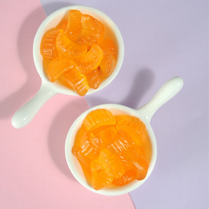 Casse-croûte gommeux sains de fruit de saveur de vitamine C de vitamines gommeuses oranges de fruit